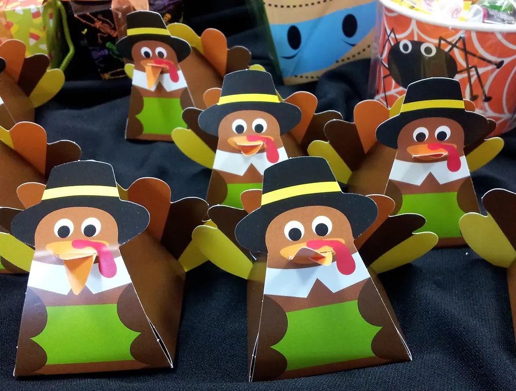 A collection of Thanksgiving turkey party favors, designed to enhance the festive atmosphere of a holiday gathering.
